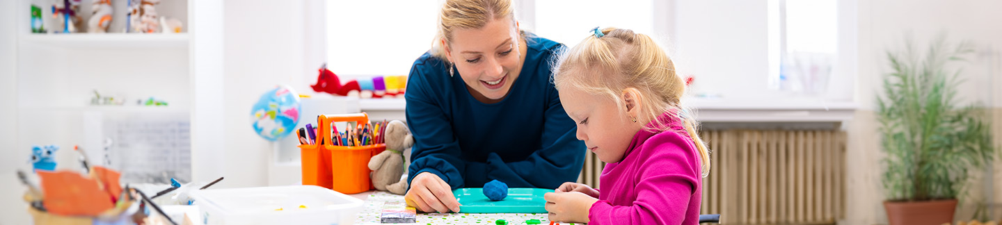 A little girl receiving quality applied behavior analysis.