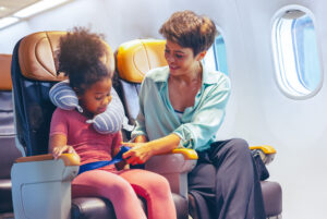 A mother traveling on a plane with her autistic child