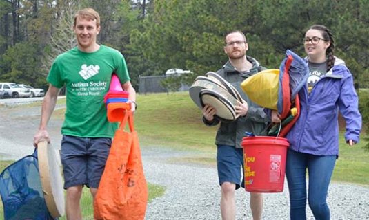 Camp Counselors break out equipment for some outdoor games.