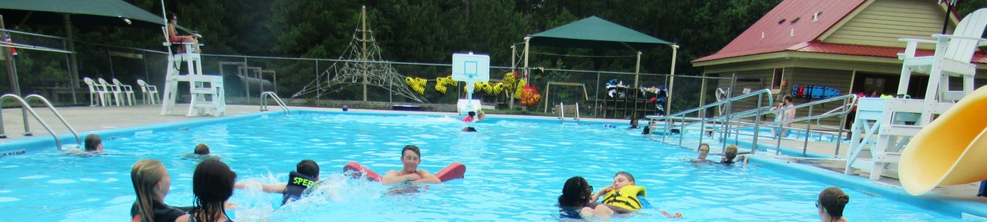 Campers playing in the pool at Camp Royall