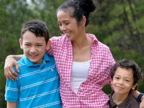 It is our mission to support families - like this mother and her two sons.