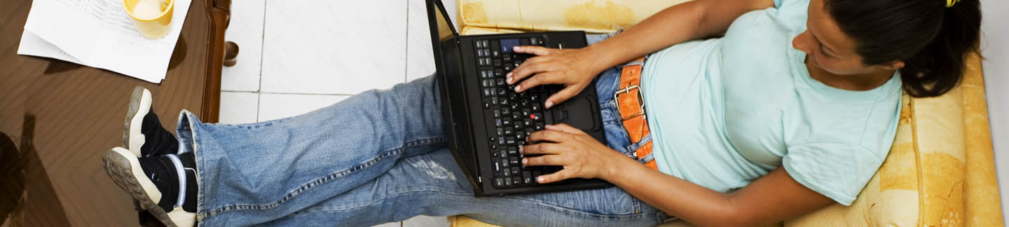 A person attending an autism webinar on a laptop.